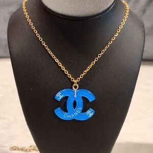VINTAGE CHANEL CC BLUE ACRYLIC PENDANT ON UNBRANDED GOLD PLATED NECKLACE